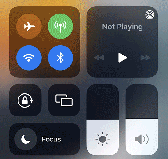 Items in iPhone Control Panel - adjust brightness and sound levels, or turn on airport mode